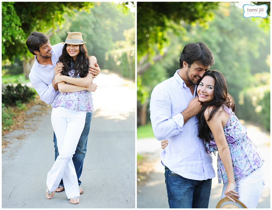 Engaged couple walking on old road in Davie.