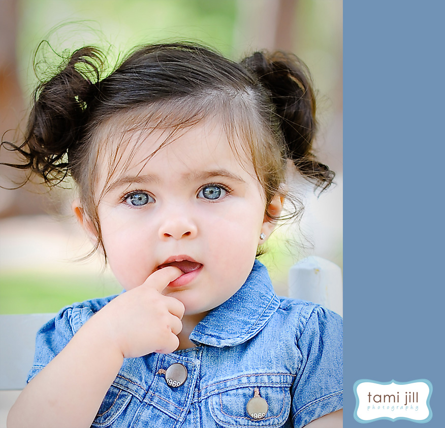 Child poses for miami photographer.