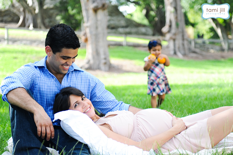 Family plays at during a Family Photography session in Miami.