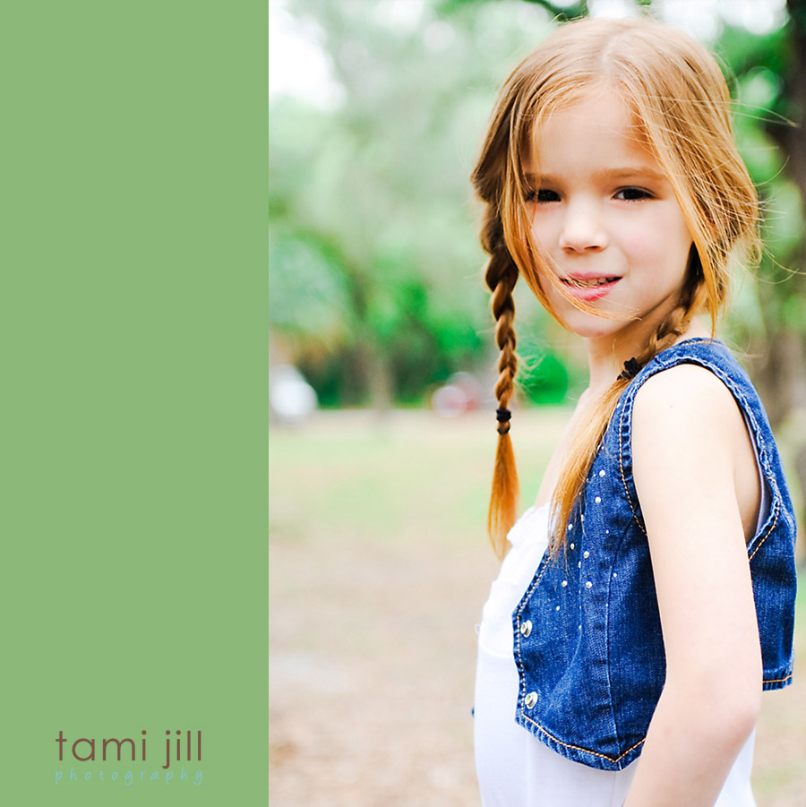 Little girl standing at beautiful Greynolds Park in Miami Beach.