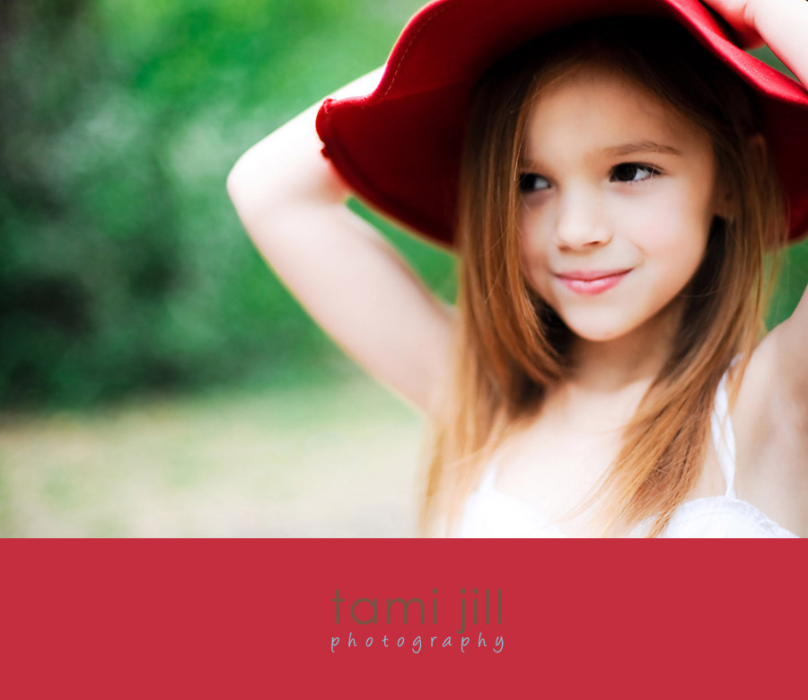 Girl wearing vintage red hat in forest.