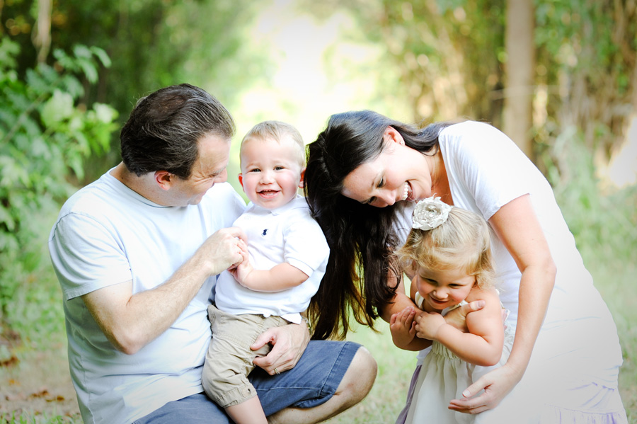 Family playing at Robbins Park in Davie.