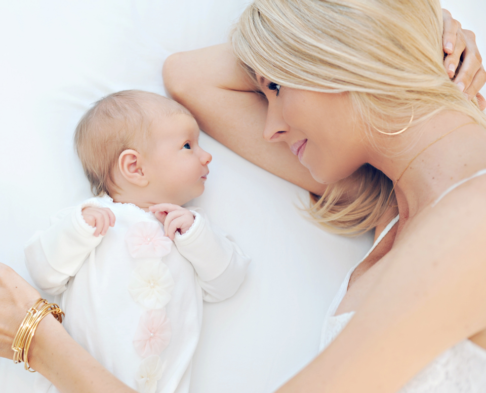 Newborn baby and mommy during Miami Newborn Photo Session.