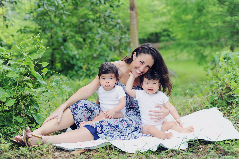 Mommy poses with her twins during a Baby photography session in Miami.