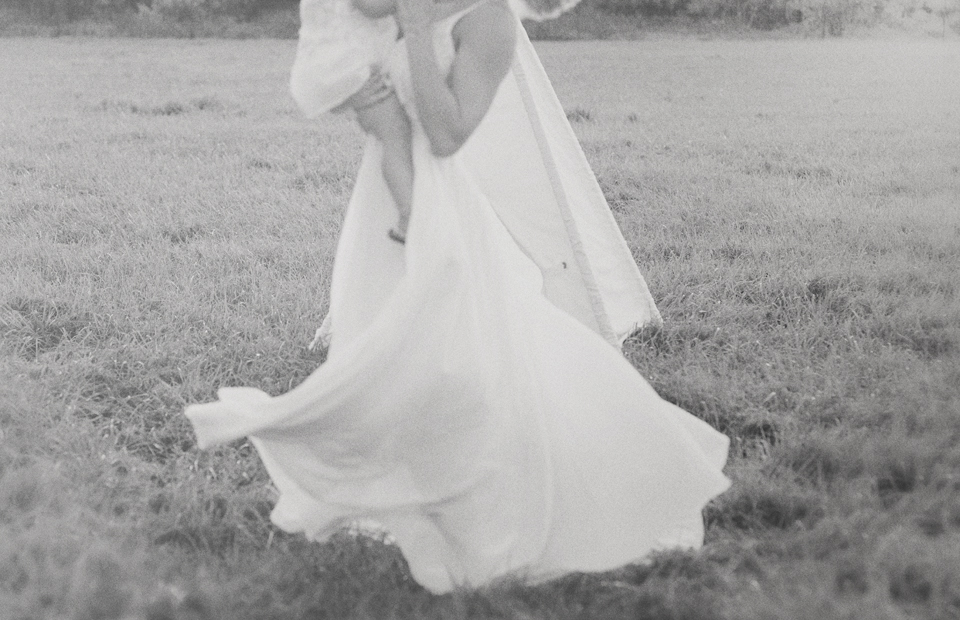 Mother twirling dress during Davie Photography session.