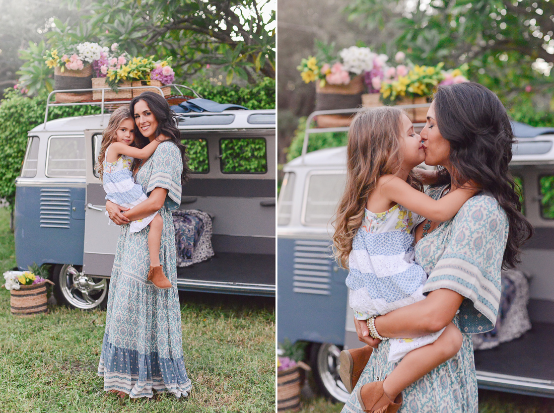 Mother and daughter with vintage VW Bus