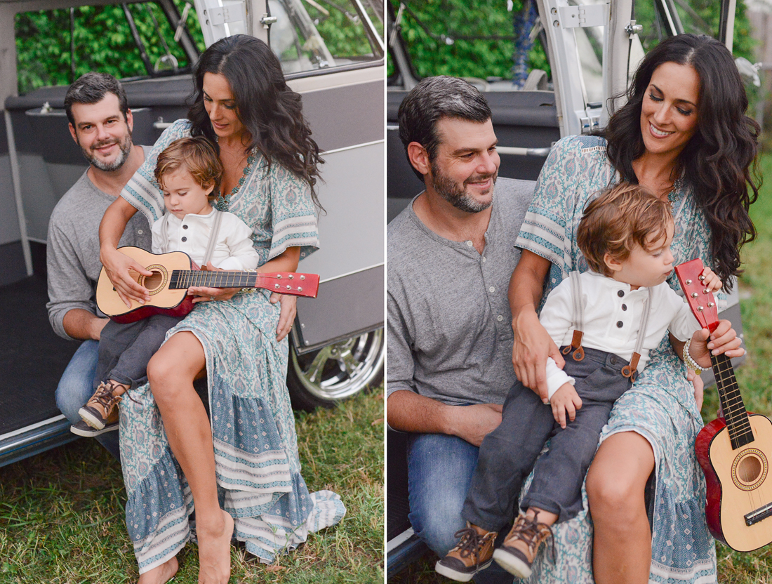 Family plays guitar in Vintage VW Bus.